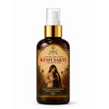 Kesh Sakti hair growth tonic bottle with gold cap on a white background