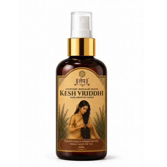 Kesh Vriddhi hair growth tonic bottle with gold cap on a white background
