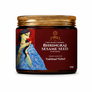 Jar of Bhringraj Sesame Seed hair mask with a colorful label featuring a woman.