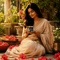 a premium amber glass jar of lep hibiscus and aloe hair mask for complete hair nutrition with a golden cap. the sleek black product label features traditional indian artwork of a woman combing her long dark hair, elegant gold typography, and the text 