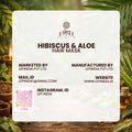 Hibiscus & Aloe Hair Mask packaging with brand details on a natural background